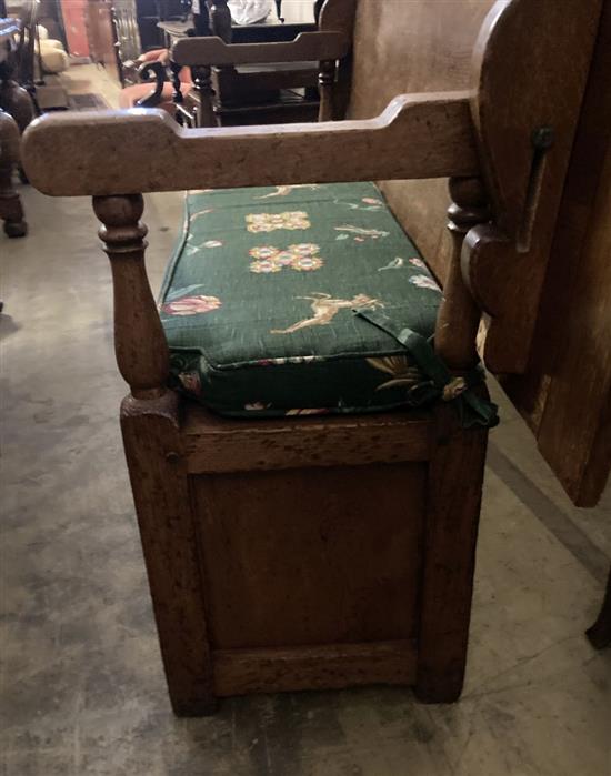 An 18th century style oak monks bench / hall table, width 199cm, depth 72cm, height 117cm